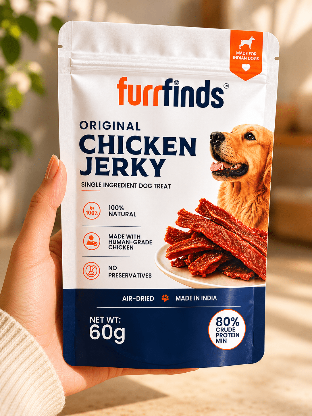 Hand holding furrfinds Original Chicken Jerky natural dog treats made with real chicken breast