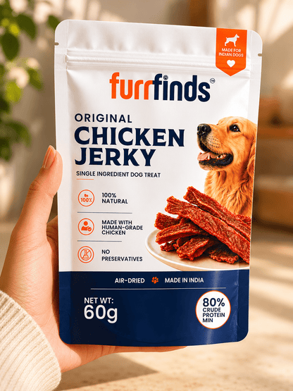 Hand holding furrfinds Original Chicken Jerky natural dog treats made with real chicken breast